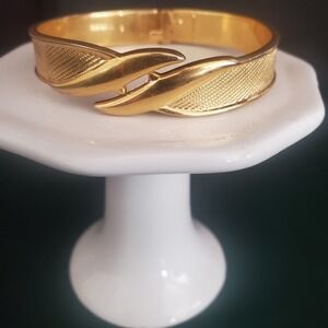 Vintage Monet Gold Tone Hinged‎ Bangle Bracelet Textured With Smooth Edge Signed